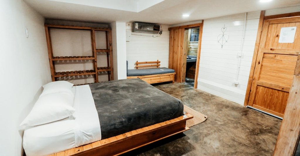 Cozy rustic bedroom featuring wooden furniture and modern amenities, perfect for a serene retreat.